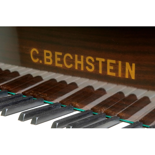 363 - A C. Bechstein Model L baby grand piano, stencilled 127574, in a mahogany case, on tapering square l... 