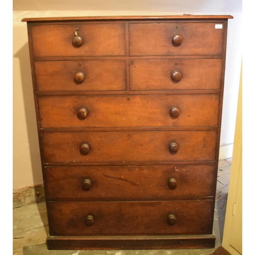 44 - A large Victorian mahogany chest, having four short and four graduated long drawers, on a plinth bas... 