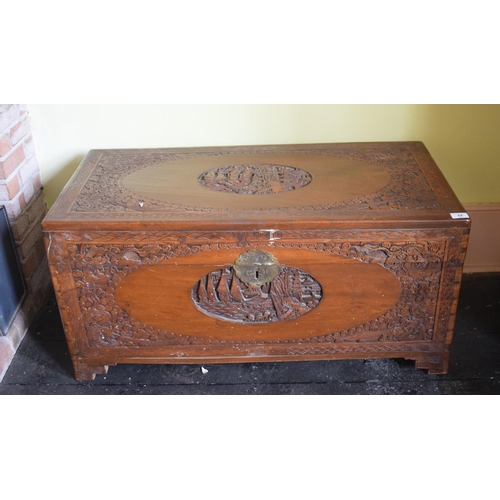 64 - A Chinese carved camphorwood chest, 94 cm wide, removal cost B