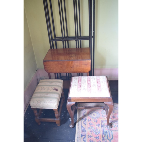 66 - An 18th century style walnut stool, 50 cm wide, another stool, two occasional tables, and a screen/r... 