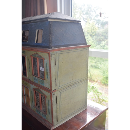 121 - A late 19th/early 20th century three storey doll's house, No 5, with a large group of assorted furni... 