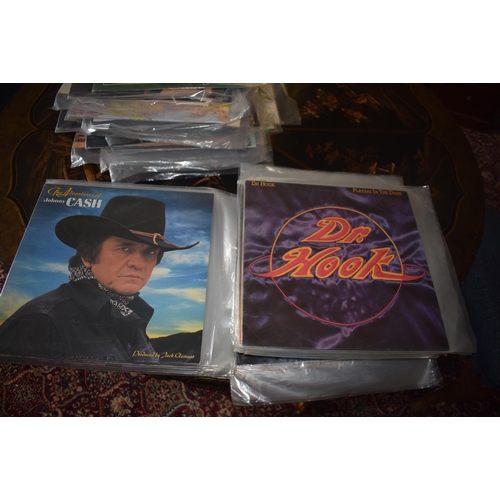 144 - A large quantity of assorted 33 rpm records, including country and western, film and others, a group... 