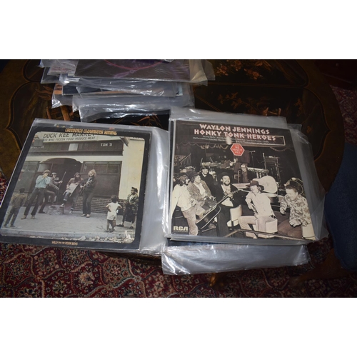 144 - A large quantity of assorted 33 rpm records, including country and western, film and others, a group... 