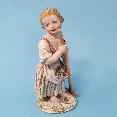 257 - A 19th century Dresden figure, of a young boy, crossed swords mark to base, 14 cm, a Dresden figure ... 