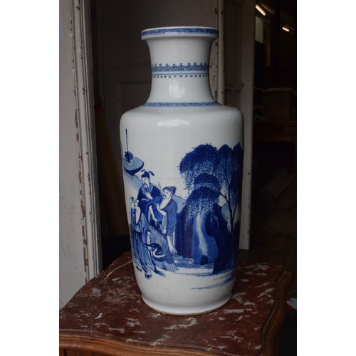 309 - A Chinese rouleau vase, decorated a man breathing fire with a dragon and other figures in underglaze... 