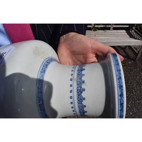 309 - A Chinese rouleau vase, decorated a man breathing fire with a dragon and other figures in underglaze... 