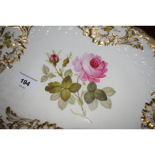 194 - A 19th century botanical part dessert service, decorated with flowers, highlighted in gilt, comprisi... 