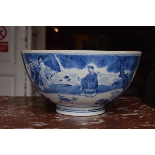 301 - A Chinese bowl, decorated figures in underglaze blue, six character mark to base, 21 cm diameter, re... 