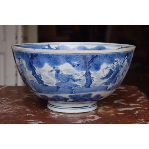 301 - A Chinese bowl, decorated figures in underglaze blue, six character mark to base, 21 cm diameter, re... 