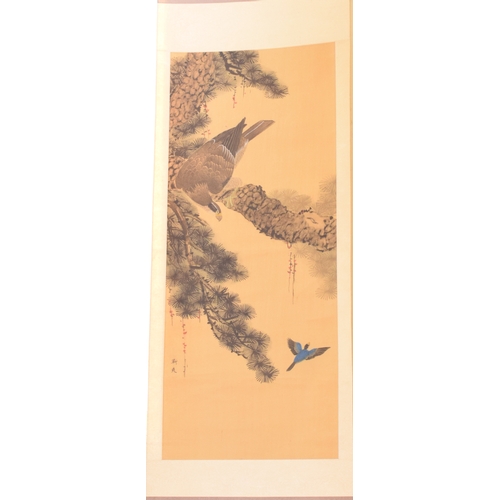 648 - A Japanese hanging scroll, decorated an eagle in a pine tree, signed, the image 93 cm x 38 cm