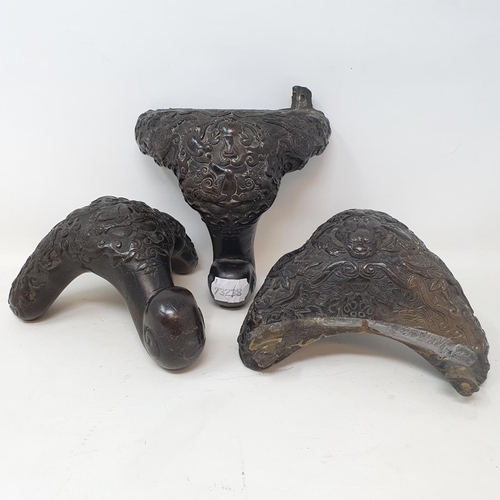 649 - A set of three Chinese bronze feet, decorated mythical beasts and foliage, 16 cm (3)