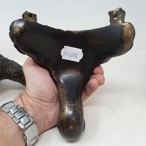 649 - A set of three Chinese bronze feet, decorated mythical beasts and foliage, 16 cm (3)