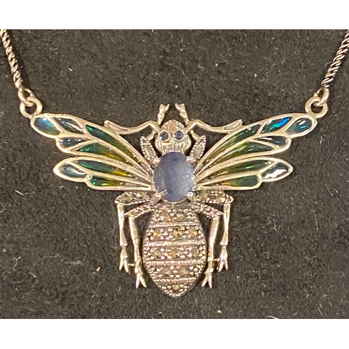 158 - A modern silver coloured metal bee necklace, with enamel wings