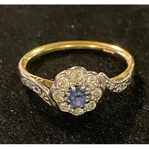 189 - A yellow coloured metal and sapphire cluster ring, marks indistinct, approx. ring size T, 3.4 g (all... 