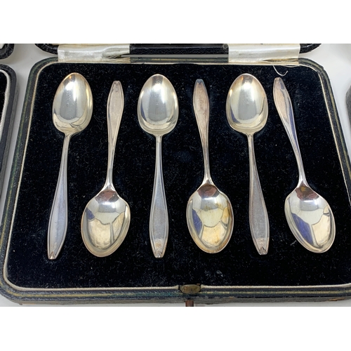 8 - A set of six silver teaspoons, in a Harrods case, another set similar, and a set of six silver coffe... 