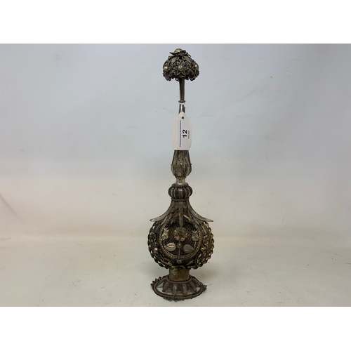 12 - An Indian silver coloured metal rosewater sprinkler, 31 cm high