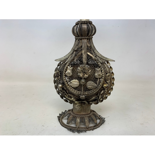 12 - An Indian silver coloured metal rosewater sprinkler, 31 cm high