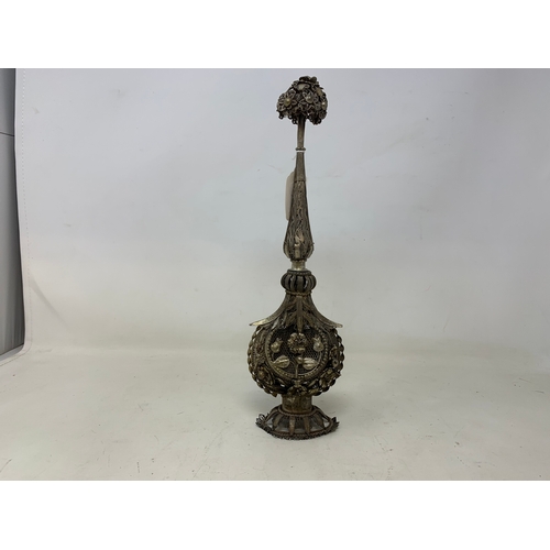 12 - An Indian silver coloured metal rosewater sprinkler, 31 cm high