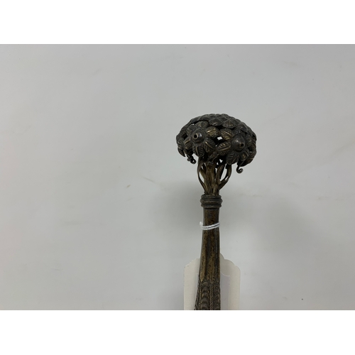 13 - An Indian silver coloured metal rosewater sprinkler, 31 cm high