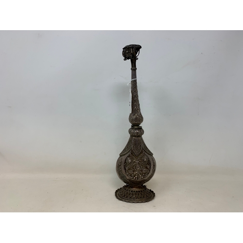 14 - An Indian silver coloured metal rosewater sprinkler, 31 cm high