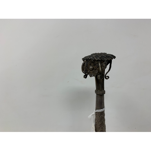 14 - An Indian silver coloured metal rosewater sprinkler, 31 cm high