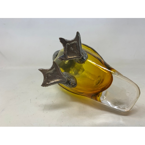 15 - A modern silver plated and amber glass claret jug, in the form of a duck, 28 cm high