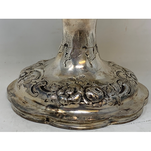 17 - A large Victorian silver two-handle trophy cup, with rococo style embossed decoration, London 1861, ... 