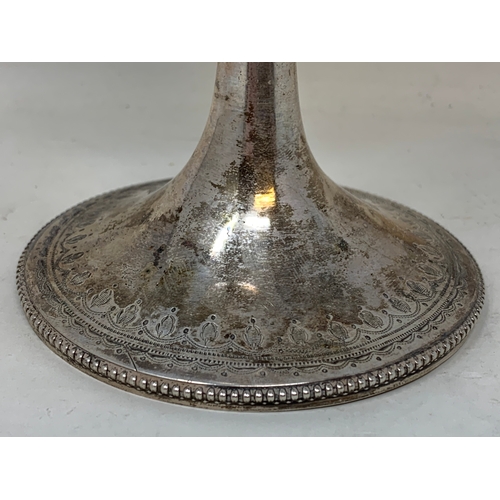 19 - A Victorian silver trophy goblet, indistinctly inscribed, and decorated flowers and foliage, London ... 