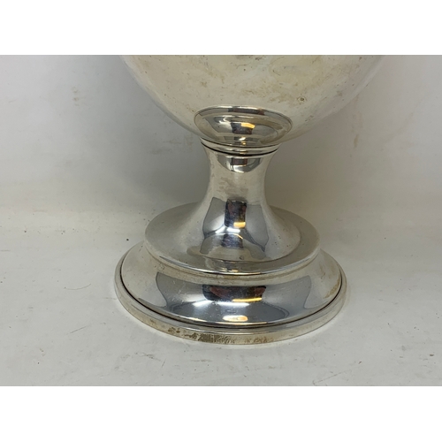 20 - A silver trophy goblet, inscribed and dated 1949, London 1934, 9.2 ozt, 18.5 cm high