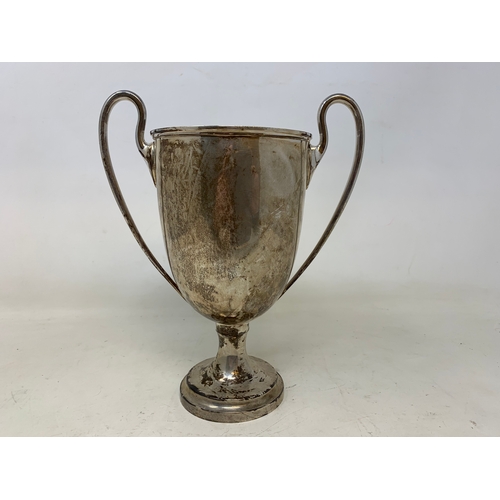 21 - A silver two-handle trophy, Birmingham 1919, 13.2 ozt, 20.5 cm high