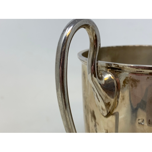 21 - A silver two-handle trophy, Birmingham 1919, 13.2 ozt, 20.5 cm high