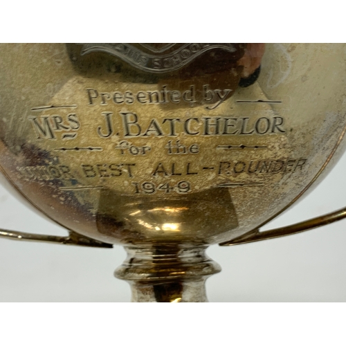 23 - A silver two-handle trophy cup, inscribed and dated 1949, London 1924, 7.7 ozt, 12.5 cm high