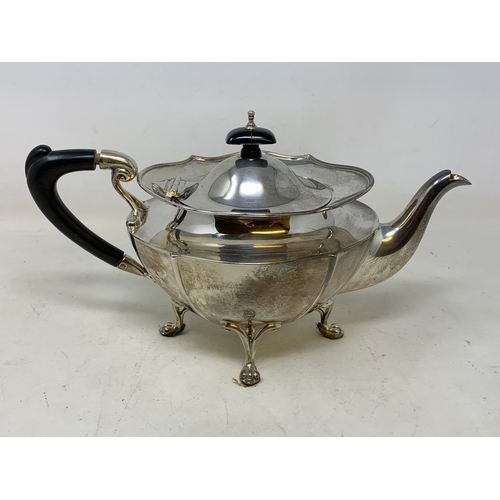 25 - A silver teapot, of shaped oval form, marks rubbed, probably Birmingham 1920, 19.1 ozt (all in), 14.... 