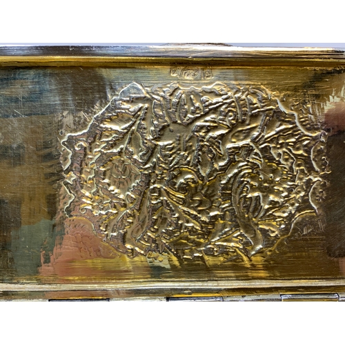 30 - A Persian silver coloured metal table cigarette box, decorated birds, flowers and foliage, 16.5 cm w... 