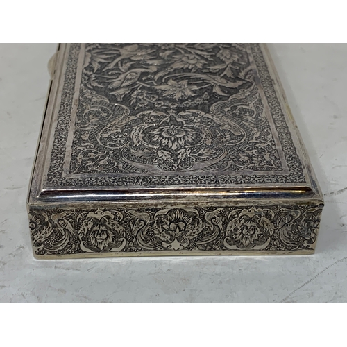 30 - A Persian silver coloured metal table cigarette box, decorated birds, flowers and foliage, 16.5 cm w... 