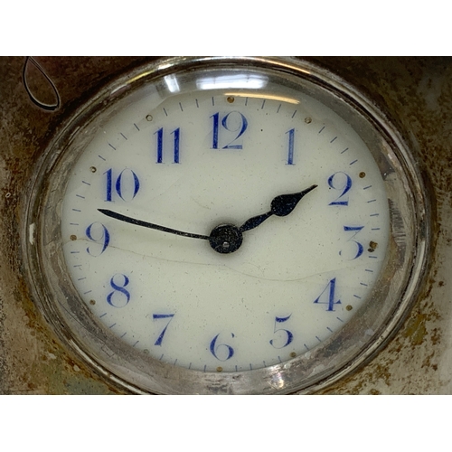 41 - An Edward VII travelling clock, the 3.5 cm dial with Arabic numerals, in a silver case, inscribed Gl... 