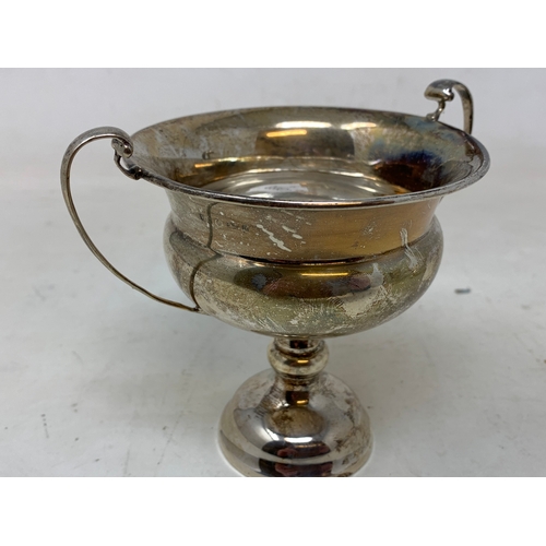 47 - Three silver two handle trophy cups, 8.3 ozt (3)