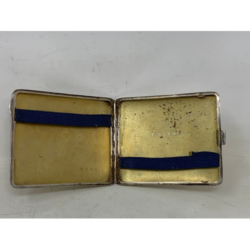 49 - A silver cigarette case, two silver condiments, and a small silver trophy cup, 8.8 ozt