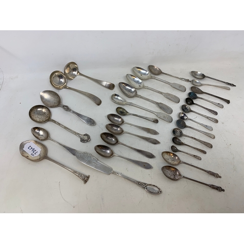 62 - Assorted silver spoons and other cutlery, various dates and makers, 11.8 ozt