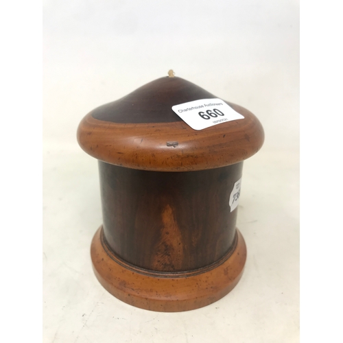 660 - A treen lignum vitae string dispenser, 12 cm high