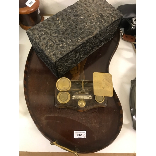 661 - An Indian carved ebony box, 30.5 cm wide, an Edwardian inlaid mahogany kidney shaped tray and a set ... 