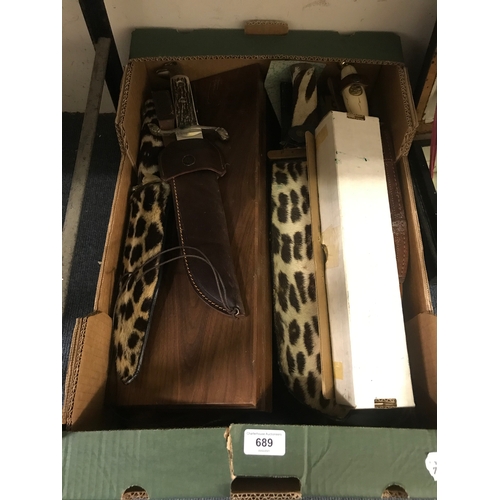 689 - A large group of Bowie and other knives (box)