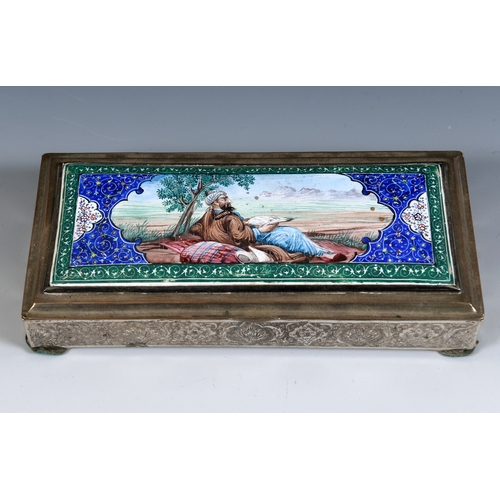 38 - A Persian silver coloured metal and enamel table cigarette box, decorated a reclining figure reading... 