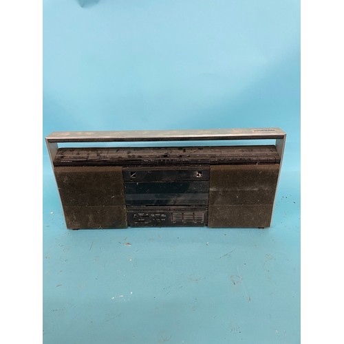 28 - A Bang & Olufsen portable radio/tape player, 51 cm