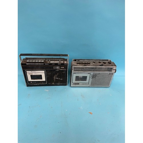 63 - A Roberts R606-NB portable radio, various other portable radios and other items (qty)