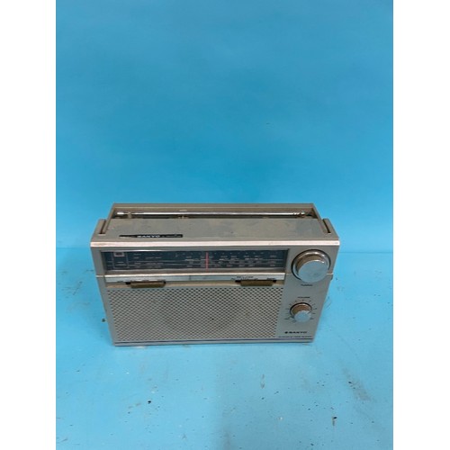 63 - A Roberts R606-NB portable radio, various other portable radios and other items (qty)