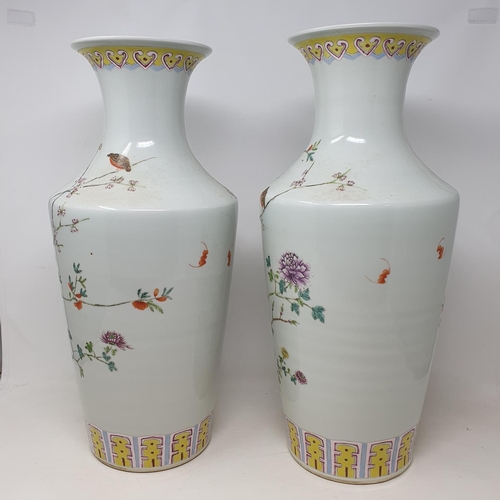 315 - A pair of modern Chinese famille rose vases, decorated flowers, 47 cm high