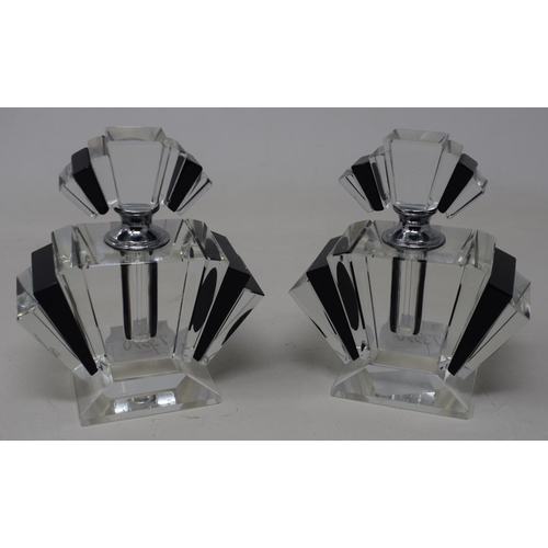 307 - A pair of modern cut glass scent bottles, 12 cm high