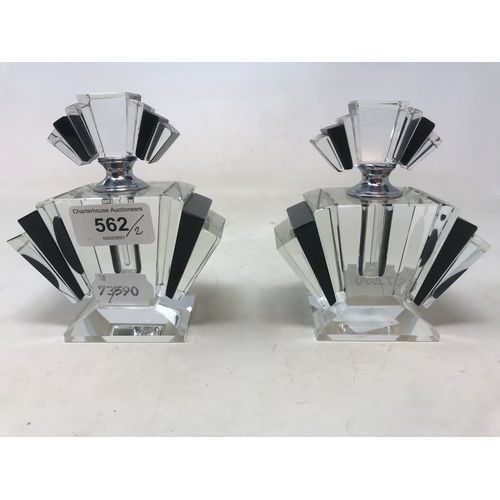 307 - A pair of modern cut glass scent bottles, 12 cm high