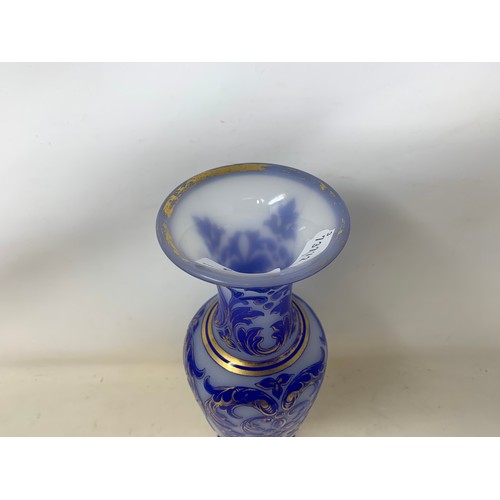 323 - A late 19th/early 20th century blue and white cameo glass vase, highlighted in gilt, 30 cm high